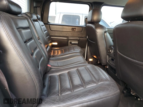 2006 Hummer H2 with VIN 5GRGN22U56H105928, listed as a Copart auction lot 76692904 with 0 mi miles and Salvage Title. Bid and sale history available at carsss.com. Image 10.