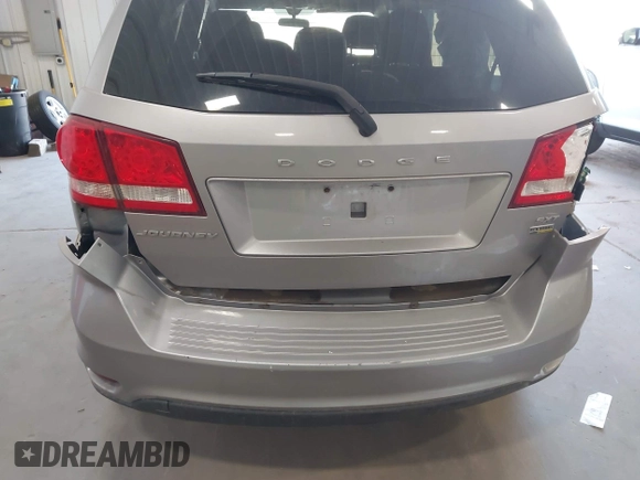 2015 Dodge Journey SXT z VIN 3C4PDCBG1FT587061, wystawiony jako IAAI lot #42186693 z przebiegiem 186 551 mil mil oraz . Historia ofert i sprzedaży dostępna na DreamBid. Obrazek 12.