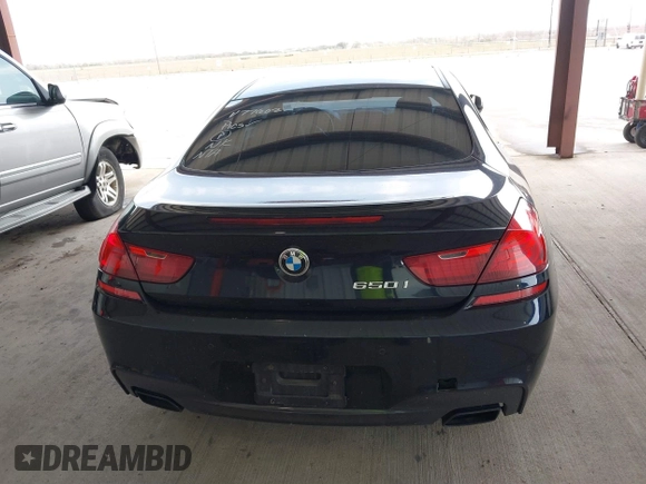 2012 BMW 6 Series 650i z VIN WBALX3C51CDV77602, wystawiony jako IAAI lot #41668235 z przebiegiem 103 684 mil mil oraz . Historia ofert i sprzedaży dostępna na DreamBid. Obrazek 16.