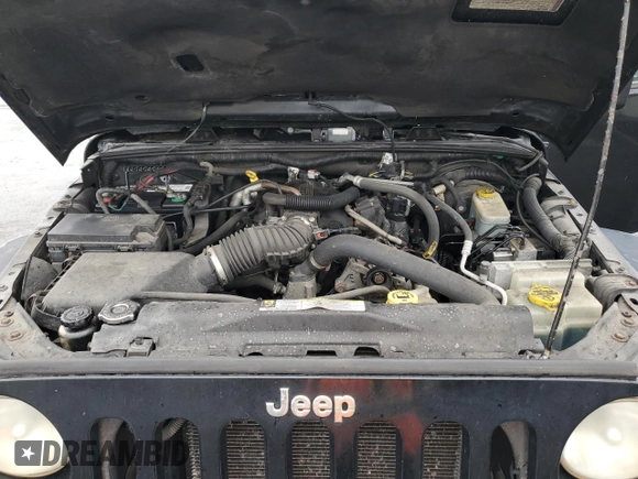 2009 Jeep Wrangler Sahara with VIN 1J4FA54109L702963, listed as a Copart auction lot 89211555 with 125,138 mi miles and Clean title. Bid and sale history available at DreamBid. Image 12.