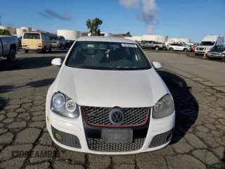2009 Volkswagen GTI z VIN WVWHD71KX9W061673, wystawiony jako Copart lot #80168754 z przebiegiem 153 396 mil mil oraz Czysty tytuł • Clean title. Historia ofert i sprzedaży dostępna na DreamBid. Obrazek 5.