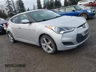 2012 Hyundai Veloster w/Gray Int с VIN KMHTC6AD8CU063977, выставлен на аукционе IAAI как лот 41494419 с пробегом 192 179 миль миль и . История ставок и продаж доступна на DreamBid. Изображение 1.