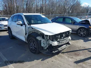2018 Mazda CX-5 Grand Touring with VIN JM3KFBDM6J0435579, listed as a IAAI auction lot 41208899 with 131,212 mi miles. Bid and sale history available at carsss.com. Image 1.