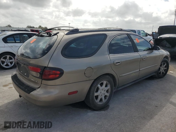2003 Mercury Sable LS Premium z VIN 1MEFM59S03A606329, wystawiony jako Copart lot #79331624 z przebiegiem 152 059 mil mil oraz Nie do naprawy. Historia ofert i sprzedaży dostępna na DreamBid. Obrazek 3.