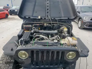 2005 Jeep Wrangler X with VIN 1J4FA39S25P367360, listed as a Copart auction lot 57504365 with 112,125 mi miles and Salvage title. Bid and sale history available at DreamBid. Image 11.