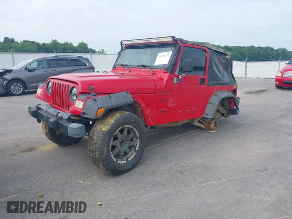 2001 Jeep Wrangler Sport z VIN 1J4FA49S31P335680, wystawiony jako IAAI lot #42471312 z przebiegiem 212 927 mil mil oraz . Historia ofert i sprzedaży dostępna na DreamBid. Obrazek 2.