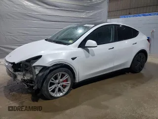 2024 Tesla Model Y Long Range with VIN 7SAYGDEE8RA266519, listed as a Copart auction lot 60899095 with Not provided miles and Salvage title. Bid and sale history available at DreamBid. Image 1.
