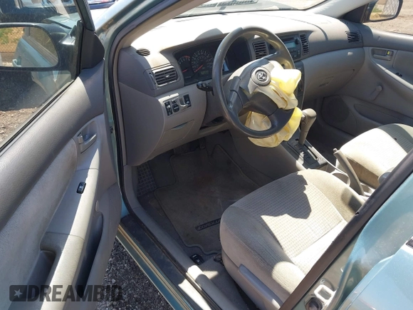 2005 Toyota Corolla CE with VIN 1NXBR32EX5Z373910, listed as a IAAI auction lot 42230582 with 64,004 mi miles and . Bid and sale history available at DreamBid. Image 13.