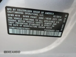 2014 Volkswagen Passat SE z VIN 1VWBT7A30EC076841, wystawiony jako Copart lot #52970685 z przebiegiem 142 628 mil mil oraz Szkoda całkowita • Salvage title. Historia ofert i sprzedaży dostępna na DreamBid. Obrazek 12.