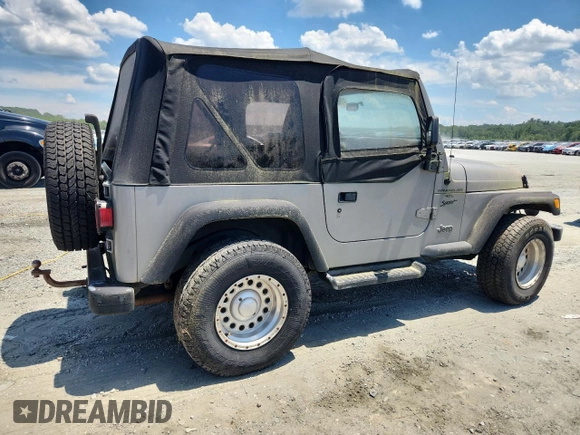 2001 Jeep Wrangler Sport with VIN 1J4FA49S21P374356, listed as a Copart auction lot 63568695 with 202,853 mi miles and Clean title. Bid and sale history available at DreamBid. Image 3.
