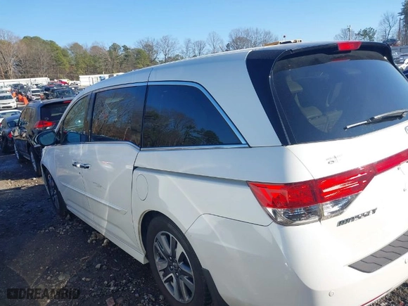 2015 Honda Odyssey Touring Elite with VIN 5FNRL5H90FB001643, listed as a IAAI auction lot 41487890 with NaN miles. Bid and sale history available at carsss.com. Image 14.