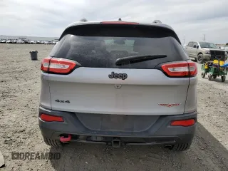 2014 Jeep Cherokee Trailhawk with VIN 1C4PJMBS6EW159174, listed as a Copart auction lot 56097795 with 130,299 mi miles and Salvage title. Bid and sale history available at DreamBid. Image 6.