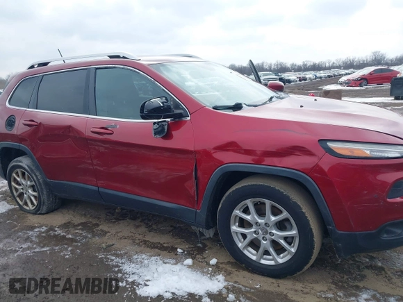 2014 Jeep Cherokee Latitude with VIN 1C4PJMCS2EW175306, listed as a IAAI auction lot 41620115 with 156,578 mi miles and . Bid and sale history available at carsss.com. Image 6.