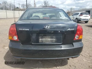 2004 Hyundai Accent GL with VIN KMHCG45C04U506196, listed as a Copart auction lot 51276195 with 75,550 mi miles and Clean Title. Bid and sale history available at carsss.com. Image 6.