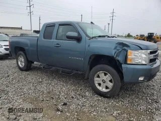 2007 Chevrolet Silverado 1500 1LT with VIN 1GCEK19J27E596422, listed as a Copart auction lot 56090475 with 199,260 mi miles and Salvage Title. Bid and sale history available at DreamBid. Image 4.