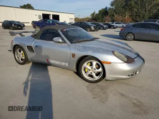 1998 Porsche Boxster с VIN WP0CA2987WS620369, выставлен на аукционе Copart как лот 81003964 с пробегом Не указан миль и Списание • Salvage title. История ставок и продаж доступна на DreamBid. Изображение 4.