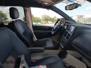 2014 Dodge Grand Caravan SXT with VIN 2C4RDGCG3ER193688, listed as a IAAI auction lot 41290544 with 73,092 mi miles and . Bid and sale history available at DreamBid. Image 5.