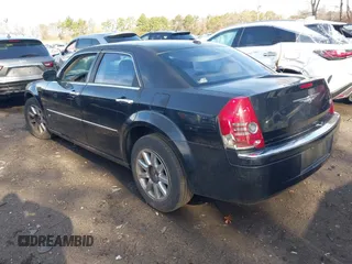 2009 Chrysler 300 Limited with VIN 2C3KA33V59H570460, listed as a IAAI auction lot 42017573 with 130,600 mi miles. Bid and sale history available at carsss.com. Image 3.