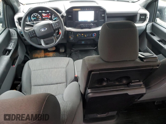 2023 Ford F-150 XL with VIN 1FTFW1E86PKG13350, listed as a Copart auction lot 87603215 with 12,534 mi miles and Salvage title. Bid and sale history available at DreamBid. Image 8.