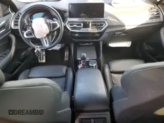 2022 BMW X4 M z VIN 5YM23EC00N9L35827, wystawiony jako Copart lot #87932635 z przebiegiem Nie podano mil oraz Szkoda całkowita • Salvage title. Historia ofert i sprzedaży dostępna na DreamBid. Obrazek 8.