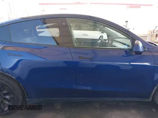 2021 Tesla Model Y Long Range z VIN 5YJYGDEE1MF296454, wystawiony jako IAAI lot #42233096 z przebiegiem 48 125 mil mil oraz . Historia ofert i sprzedaży dostępna na DreamBid. Obrazek 14.