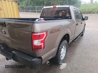 2018 Ford F-150 XL with VIN 1FTFW1E52JKE87422, listed as a IAAI auction lot 42220067 with 155,401 mi miles. Bid and sale history available at carsss.com. Image 1.