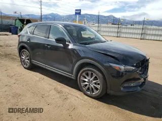 2020 Mazda CX-5 Grand Touring with VIN JM3KFBDMXL1735154, listed as a Copart auction lot 49313585 with 82,750 mi miles and Salvage Title. Bid and sale history available at DreamBid. Image 4.