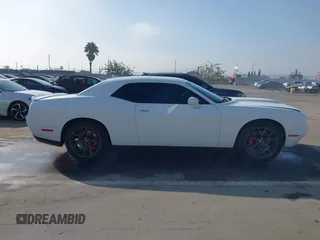 2019 Dodge Challenger GT z VIN 2C3CDZJG7KH503920, wystawiony jako IAAI lot #41604967 z przebiegiem 93 829 mil mil oraz . Historia ofert i sprzedaży dostępna na DreamBid. Obrazek 13.