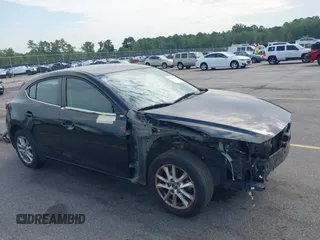 2014 Mazda 3 i Touring z VIN JM1BM1L76E1120589, wystawiony jako IAAI lot #42634582 z przebiegiem 161 785 mil mil oraz . Historia ofert i sprzedaży dostępna na DreamBid. Obrazek 1.
