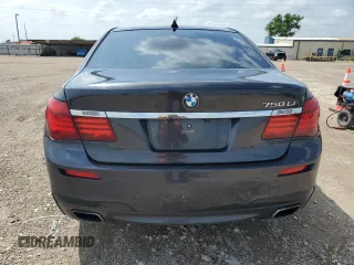 2015 BMW 7 Series 750Li z VIN WBAYE8C51FD782155, wystawiony jako Copart lot #54796505 z przebiegiem 112 772 mil mil oraz Szkoda całkowita • Salvage title. Historia ofert i sprzedaży dostępna na DreamBid. Obrazek 6.