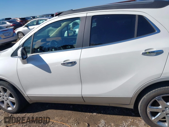 2016 Buick Encore Premium with VIN KL4CJDSB3GB617658, listed as a IAAI auction lot 41608967 with 77,566 mi miles and . Bid and sale history available at carsss.com. Image 14.