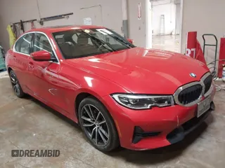 2020 BMW 3 Series 330i xDrive with VIN WBA5R7C02LFH53563, listed as a IAAI auction lot 41601961 with 59,738 mi miles. Bid and sale history available at carsss.com. Image 1.