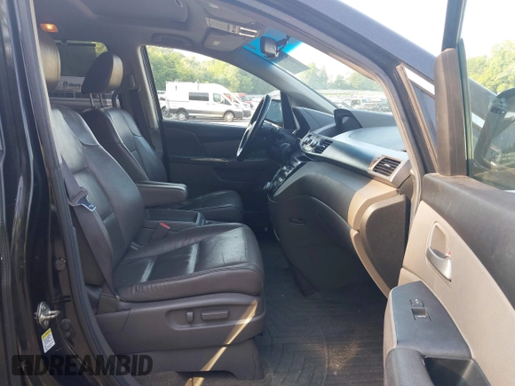 2012 Honda Odyssey EX-L with VIN 5FNRL5H60CB075811, listed as a IAAI auction lot 42518159 with 243,186 mi miles and . Bid and sale history available at DreamBid. Image 5.