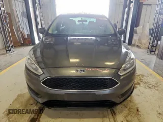 2018 Ford Focus SE with VIN 1FADP3FE0JL311760, listed as a Copart auction lot 63621755 with 81,000 mi miles and Salvage title. Bid and sale history available at DreamBid. Image 5.