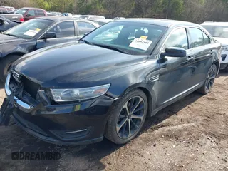 2014 Ford Taurus SEL with VIN 1FAHP2E81EG122928, listed as a IAAI auction lot 41492582 with 200,411 mi miles. Bid and sale history available at carsss.com. Image 2.
