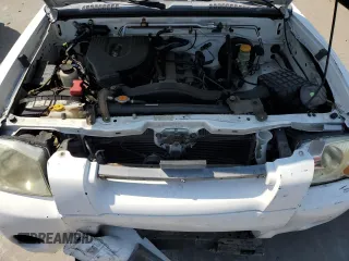 2001 Nissan Frontier XE with VIN 1N6DD26S71C385578, listed as a Copart auction lot 59875405 with 73,936 mi miles and Salvage title. Bid and sale history available at DreamBid. Image 11.