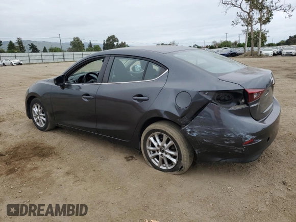 2016 Mazda 3 i Sport with VIN JM1BM1U74G1285879, listed as a Copart auction lot 54601455 with 67,136 mi miles and Salvage Title. Bid and sale history available at DreamBid. Image 2.