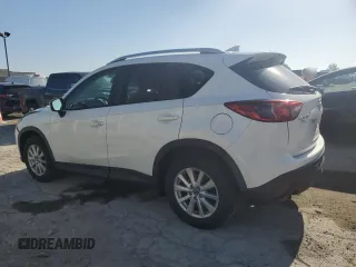 2016 Mazda CX-5 Touring z VIN JM3KE2CYXG0683673, wystawiony jako Copart lot #56724025 z przebiegiem 107 293 mil mil oraz Szkoda całkowita • Salvage title. Historia ofert i sprzedaży dostępna na DreamBid. Obrazek 2.