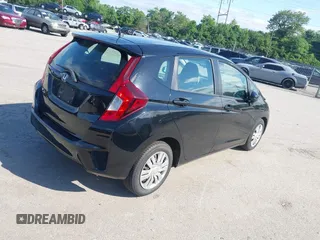 2015 Honda Fit LX with VIN 3HGGK5H51FM777364, listed as a IAAI auction lot 42297673 with 139,813 mi miles and . Bid and sale history available at DreamBid. Image 4.