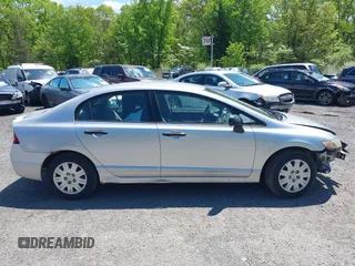 2009 Honda Civic DX-VP z VIN 2HGFA16399H349229, wystawiony jako IAAI lot #41749953 z przebiegiem 201 533 mil mil oraz . Historia ofert i sprzedaży dostępna na DreamBid. Obrazek 14.