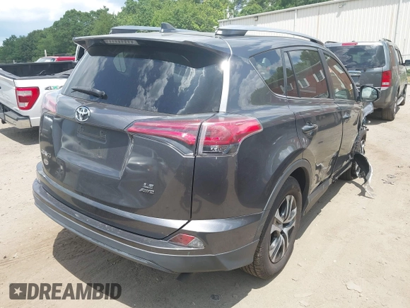 2017 Toyota RAV4 LE with VIN JTMBFREV0HJ112531, listed as a IAAI auction lot 42570843 with 79,598 mi miles and . Bid and sale history available at DreamBid. Image 4.