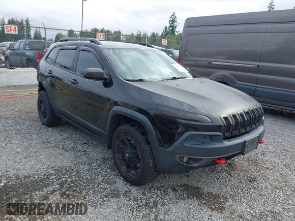 2014 Jeep Cherokee Trailhawk z VIN 1C4PJMBB1EW145683, wystawiony jako IAAI lot #42487730 z przebiegiem 148 277 mil mil oraz . Historia ofert i sprzedaży dostępna na DreamBid. Obrazek 1.