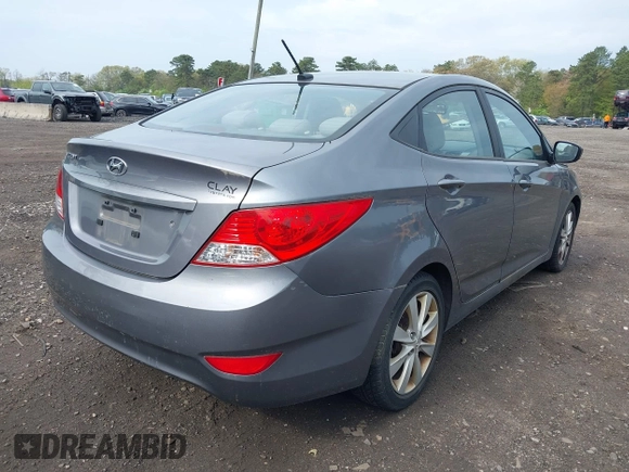 2014 Hyundai Accent GLS with VIN KMHCU4AE9EU761298, listed as a IAAI auction lot 42186032 with 118,848 mi miles and . Bid and sale history available at carsss.com. Image 4.