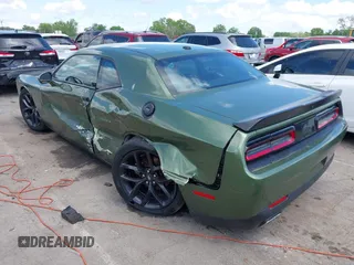 2022 Dodge Challenger GT z VIN 2C3CDZJG8NH164430, wystawiony jako IAAI lot #42009482 z przebiegiem 56 113 mil mil oraz . Historia ofert i sprzedaży dostępna na DreamBid. Obrazek 3.