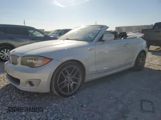 2013 BMW 1 Series 128i with VIN WBAUL7C53DVU09950, listed as a Copart auction lot 77703764 with 94,378 mi miles and Salvage Title. Bid and sale history available at carsss.com. Image 1.