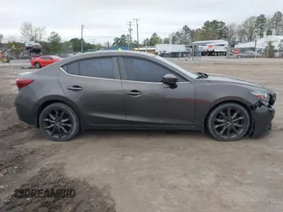 2014 Mazda 3 S Grand Touring with VIN JM1BM1W39E1145186, listed as a IAAI auction lot 41948404 with 111,702 mi miles and . Bid and sale history available at DreamBid. Image 13.