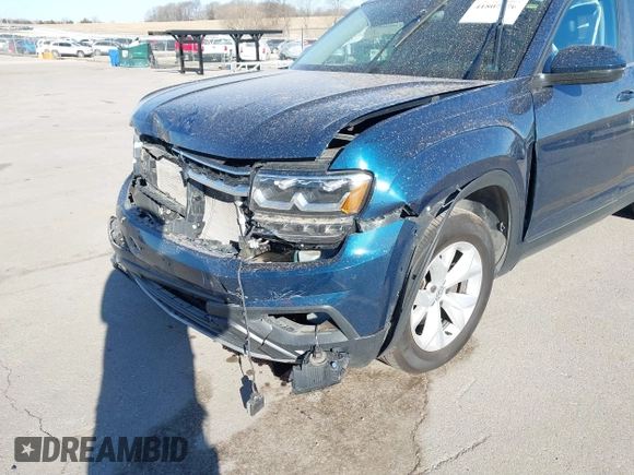 2019 Volkswagen Atlas SE z VIN 1V2WR2CA6KC564820, wystawiony jako IAAI lot #41807476 z przebiegiem 78 947 mil mil oraz . Historia ofert i sprzedaży dostępna na DreamBid. Obrazek 6.