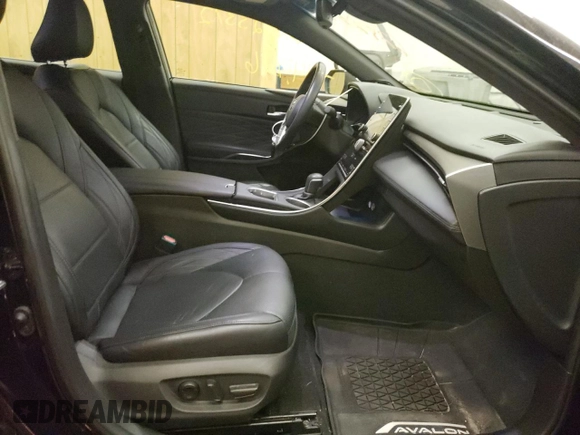 2021 Toyota Avalon Limited Hybrid z VIN 4T1CA1AB3MU001055, wystawiony jako Copart lot #62823372 z przebiegiem 14 776 mil mil oraz . Historia ofert i sprzedaży dostępna na DreamBid. Obrazek 5.