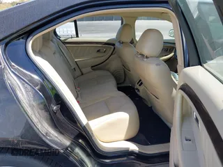 2015 Ford Taurus Limited with VIN 1FAHP2J81FG134973, listed as a IAAI auction lot 41845384 with 139,203 mi miles. Bid and sale history available at carsss.com. Image 8.