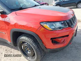 2020 Jeep Compass Trailhawk with VIN 3C4NJDDB2LT142394, listed as a IAAI auction lot 42055893 with 54,490 mi miles and . Bid and sale history available at carsss.com. Image 20.
